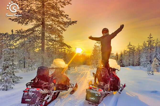 Snowmobile Safari into Arctic Wilderness - Changing into Arctic gear before the ride