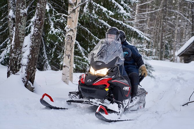 Snowmobile Safari to the Wilderness - Riding into the Arctic forest
