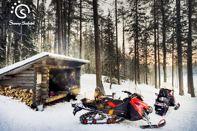 Snowmobile Whole Day Adventure - Small Group - Following the guide into Lapland’s snowy countryside