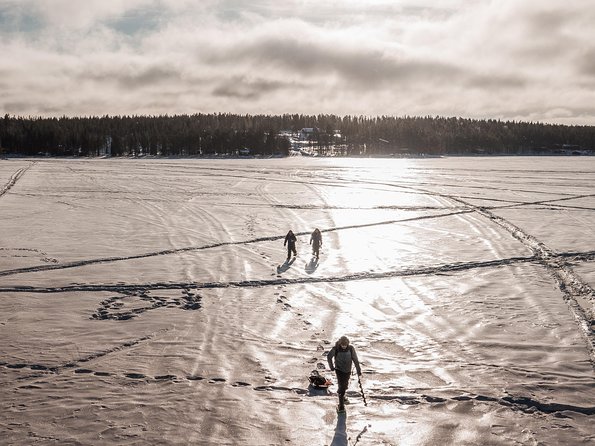 Snowshoeing and Ice Fishing Tour - Fire, sausages, and the best break of the day