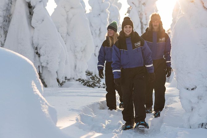 Snowshoeing in the Arctic Circle Wilderness - Fitting traditional snowshoes at the lodge