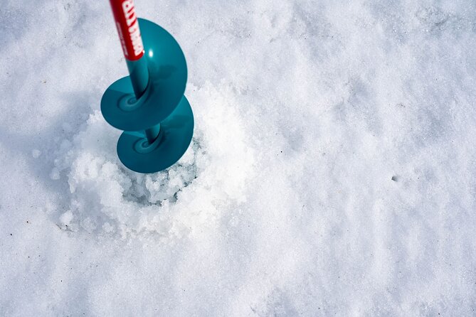 VIP Ice Fishing "ICEBREAKER" Lunch in Glass Igloo - Pickup from your hotel, with winter clothing included