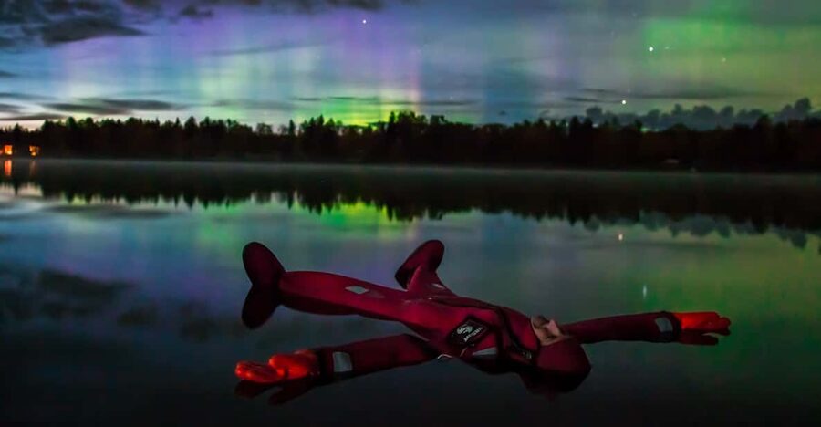 Ylläs: Northern Lights Ice-Floating Experience with Transfer - The fairy-light trail to the ice hole